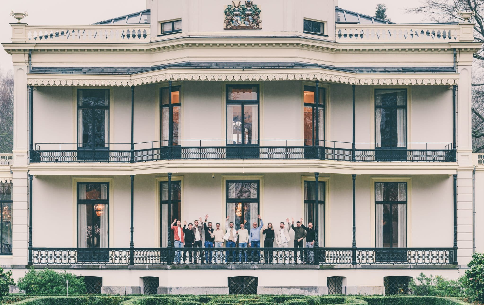 The Vanenburg estate, the ScaleUp team waving from the balcony